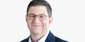 PVH CFO Zac Coughlin Is Stepping Down in Move to SiriusXM