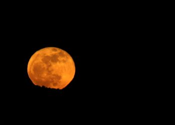 The Blue Micromoon Rises in Sunday’s Early Skies