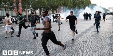 Hundreds arrested and dozens of police injured after Champions League riots in France