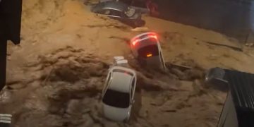 Cars swept away in China flooding