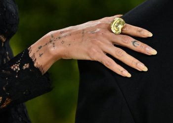 When Did Bare Nails Become a Status Symbol?