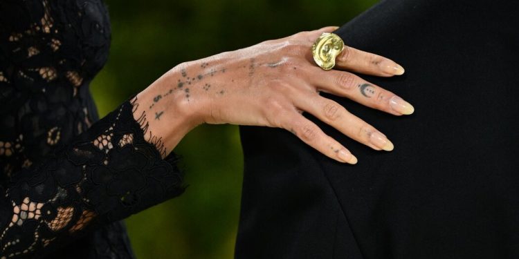 When Did Bare Nails Become a Status Symbol?