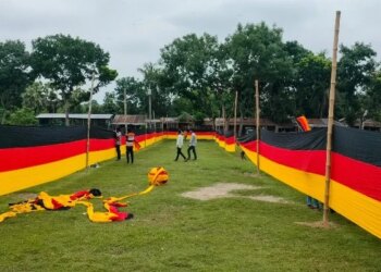 Bangladesh farmer unfurls vast Germany banner to show World Cup support