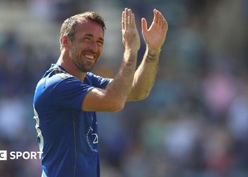 Christian Fuchs: Former Leicester City defender smashes six into river on cricket debut