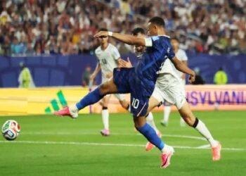 Mbappe double sends France into knockout rounds after lengthy weather delay