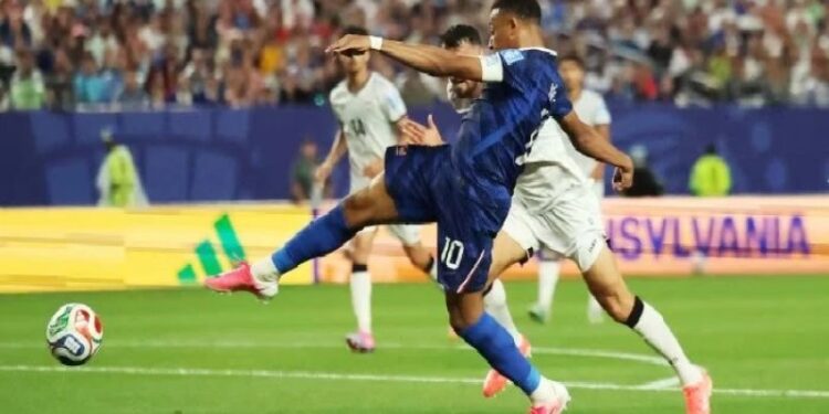 Mbappe double sends France into knockout rounds after lengthy weather delay