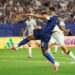 Mbappe double sends France into knockout rounds after lengthy weather delay