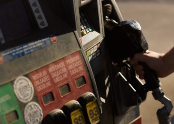 Americans are feeling a little better about the economy as gas prices ease