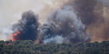Wildfires rage in Spain and Portugal, as France heatwave deaths rise