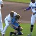 Top MLB prospect carries fainting child off field